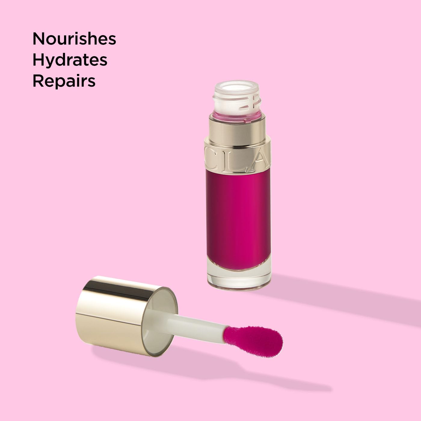 Clarins Lip Comfort Oil - Soothes, Hydrates And Plumps Lips With 93% Natural Ingredients