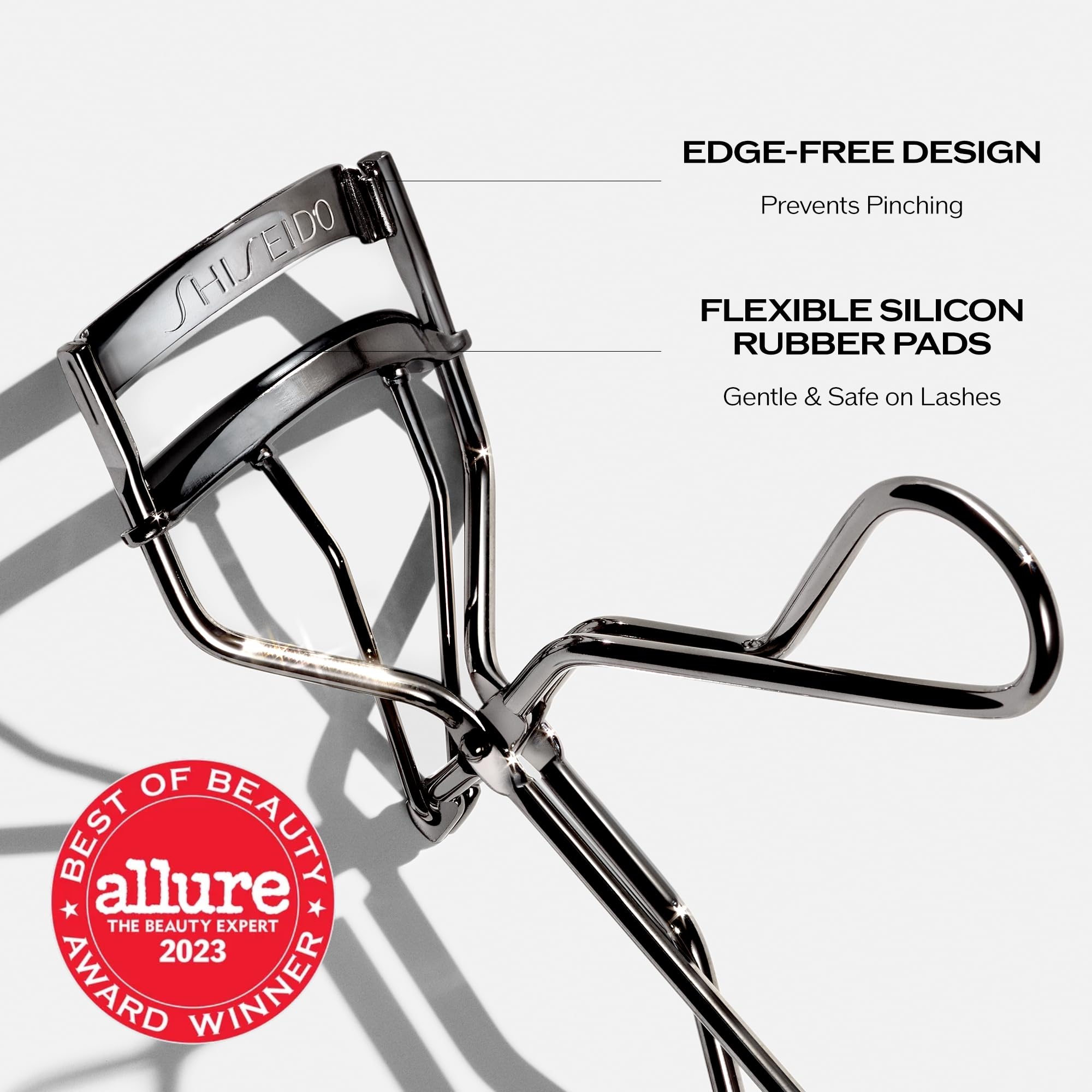 Shiseido Eyelash Curler - Crimps & Curls Lashes For Perfect, Eye-Framing Fringe - Gentle & Safe - Includes Replacement Pad